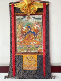 Assorted Kalachakra thanka with brocade